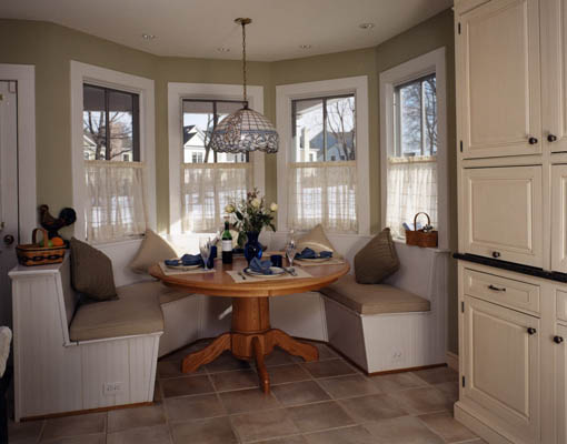 renovated country-style breakfast nook with built-in bench seating